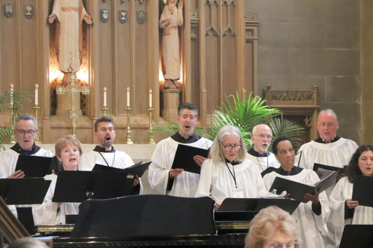 A close up of the Choir sings during service