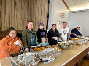 Volunteers ready to serve our Community meal